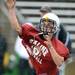 Saline High School quarterback Trent Theisen throws the ball during practice at the school on Monday, August 12, 2013. Melanie Maxwell | AnnArbor.com